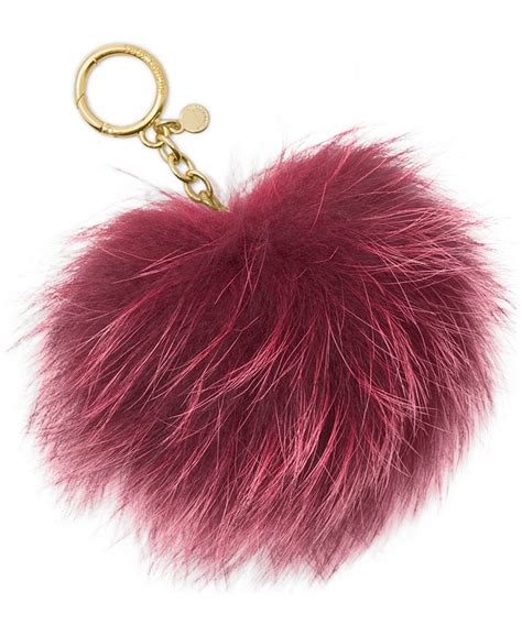 anhänger michael kors pom pom felloptik